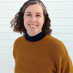 En person som smiler for kameraet